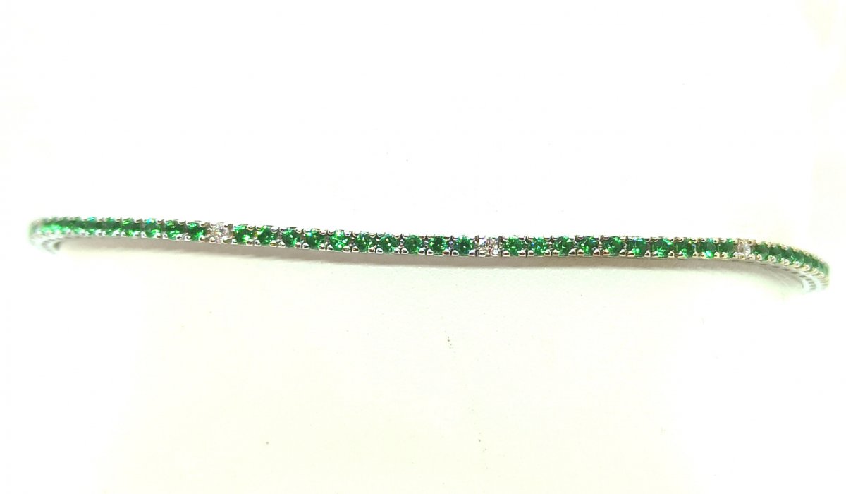 Bracciale Tennis in oro 18kt con smeraldi e diamanti